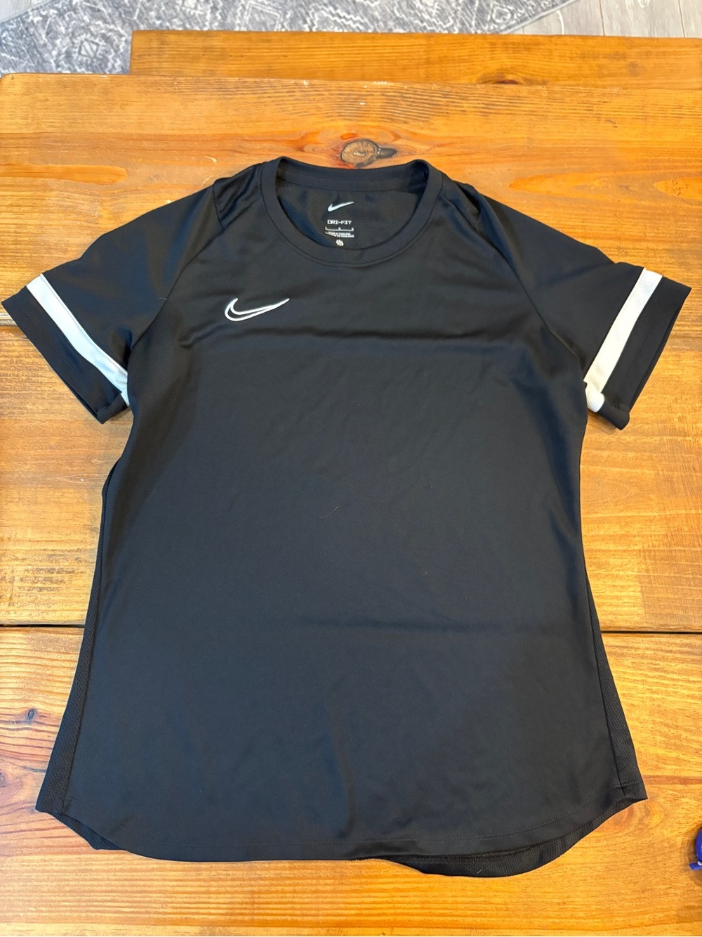 Nike Black Short-Sleeve Sports Top with White Accents
